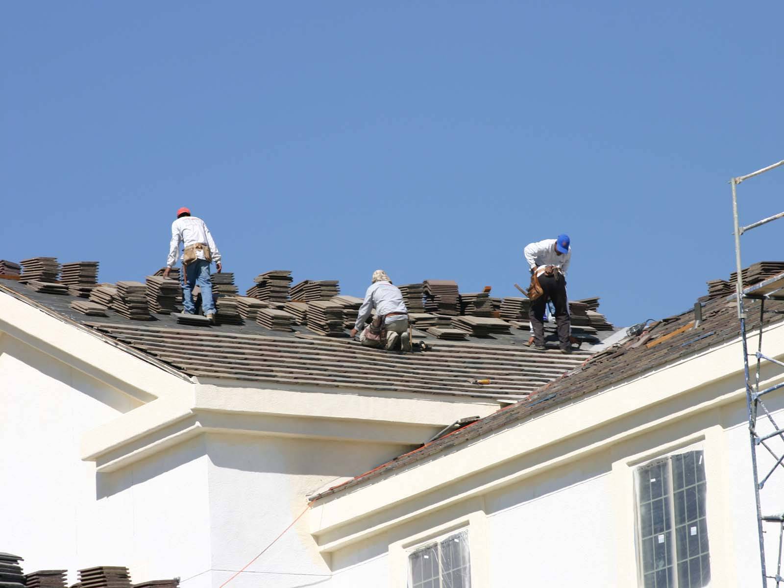 QRHI Home Improvement Contractors Replacing a Roof